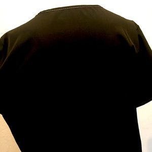 Black scrub top deep V-neck